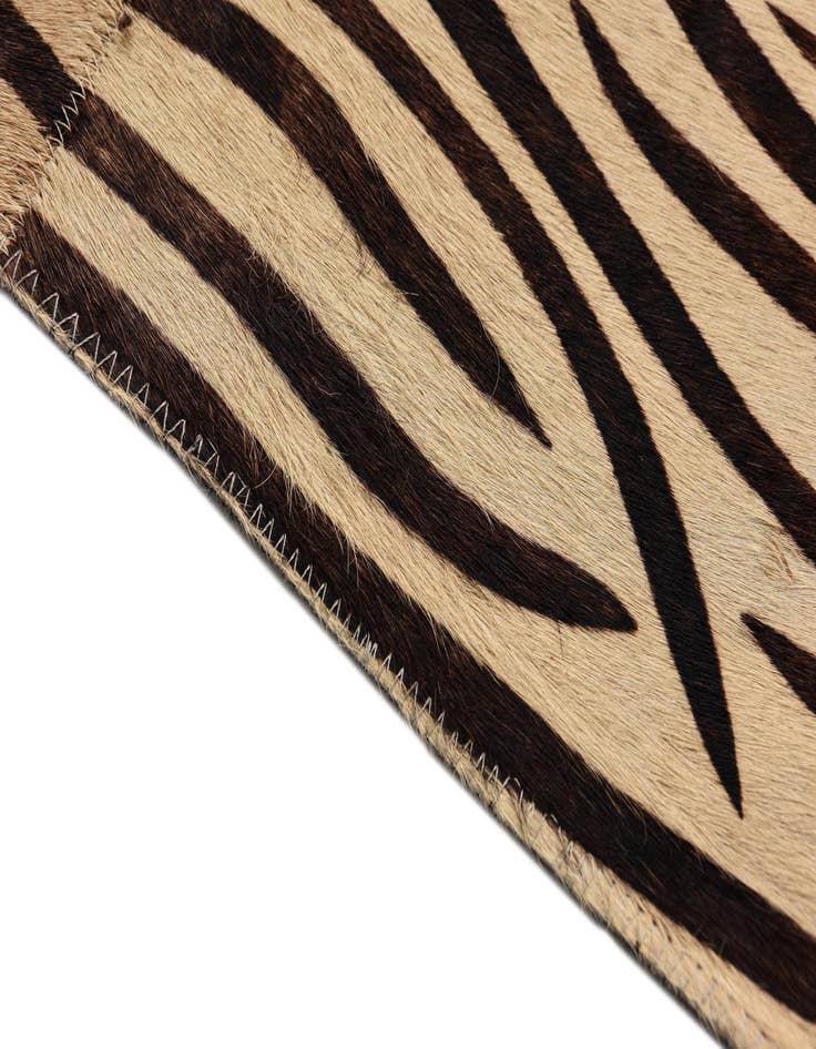 Detail image of  5' 6 x 7' 9 Cowhide Rug