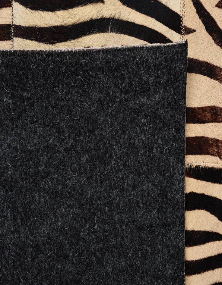 Detail image of  5' 6 x 7' 9 Cowhide Rug