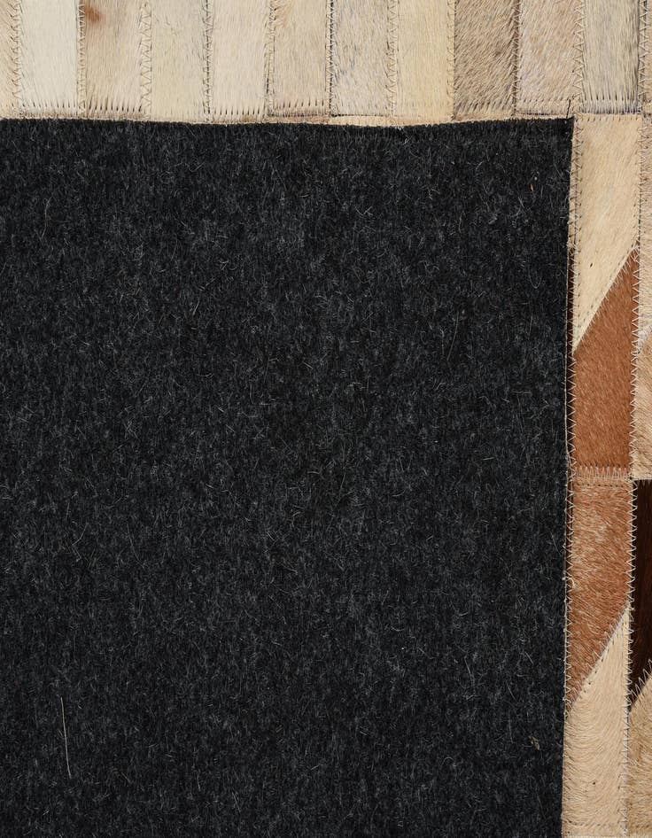 Detail image of  5' 4 x 7' 6 Cowhide Rug