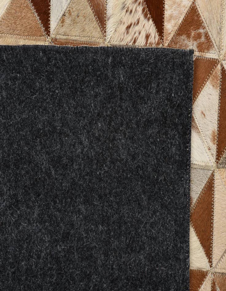 Detail image of  5' 3 x 7' 6 Cowhide Rug