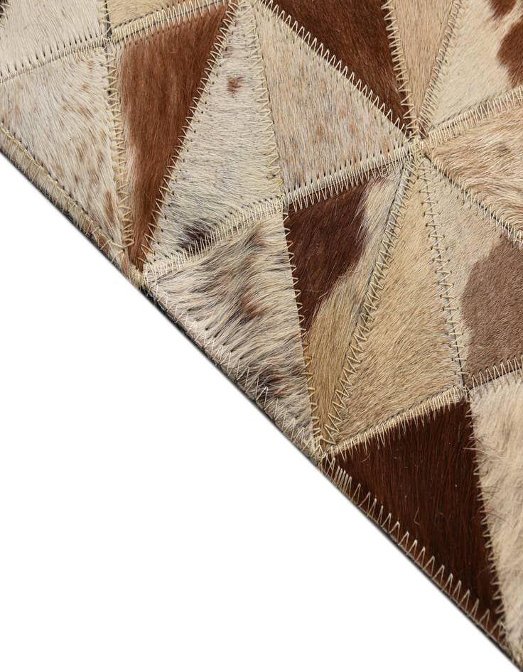 Detail image of  5' 4 x 7' 7 Cowhide Rug