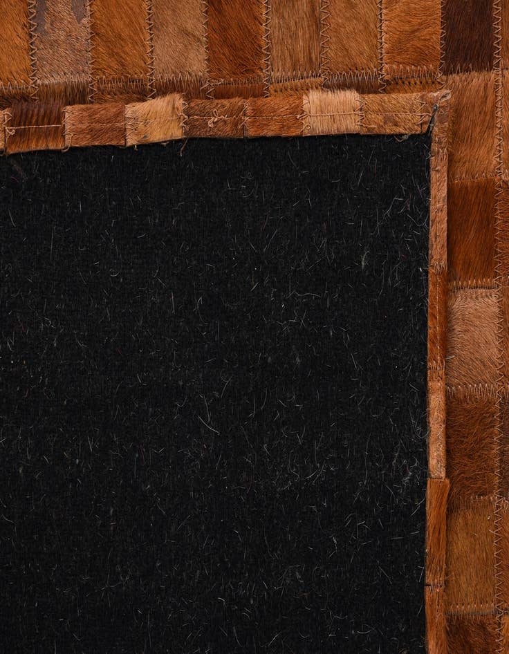 Detail image of  6' 7 x 9' 9 Cowhide Rug