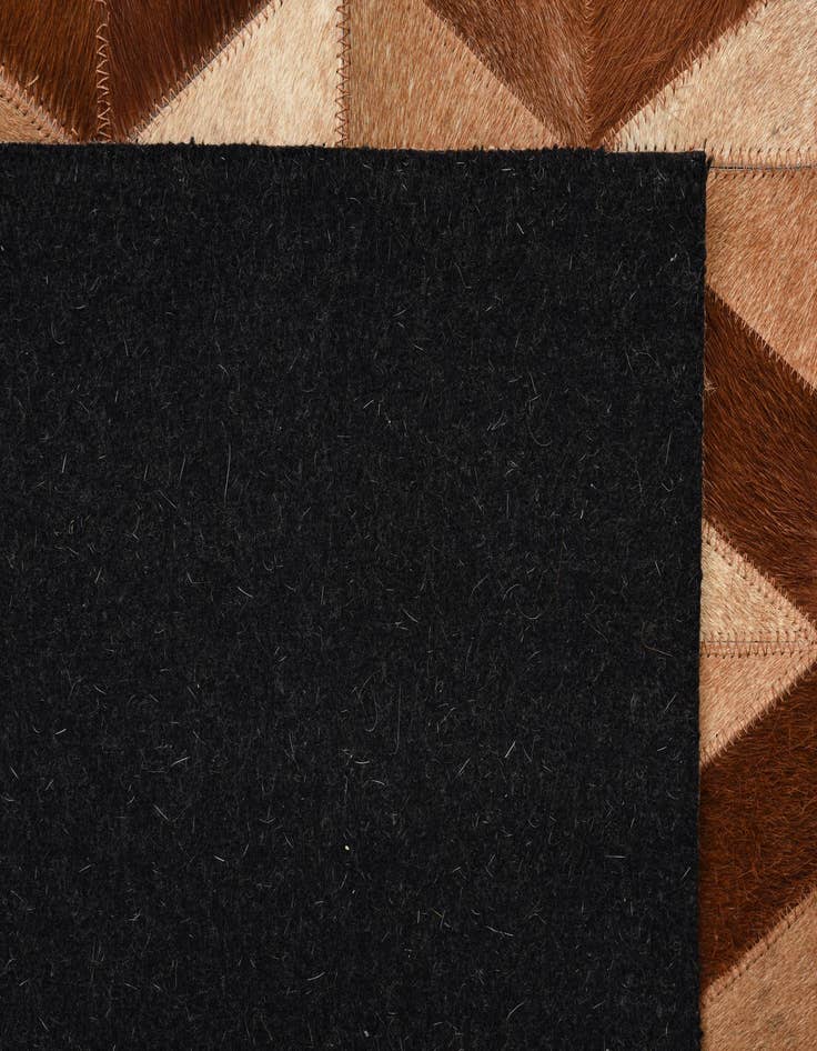 Detail image of  5' 1 x 8' 2 Cowhide Rug