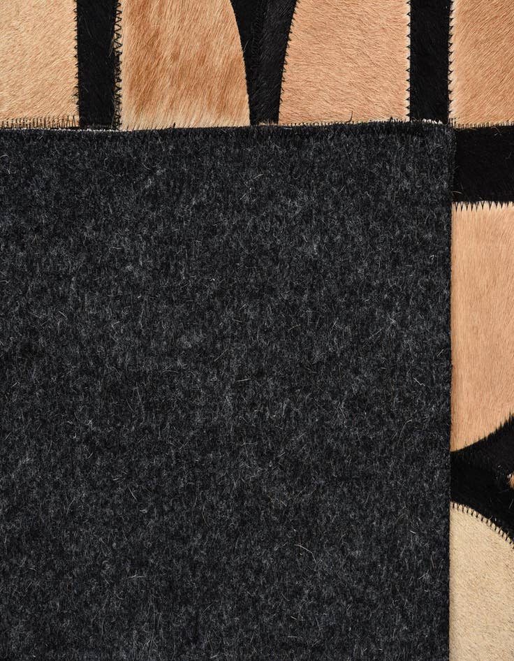 Detail image of  5' x 7' 9 Cowhide Rug