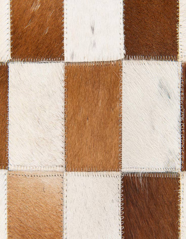 Detail image of  5' x 7' 11 Cowhide Stocks Rug