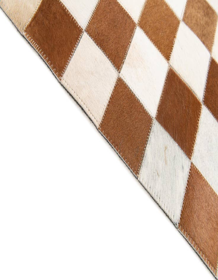 Detail image of  5' x 7' 11 Cowhide Stocks Rug