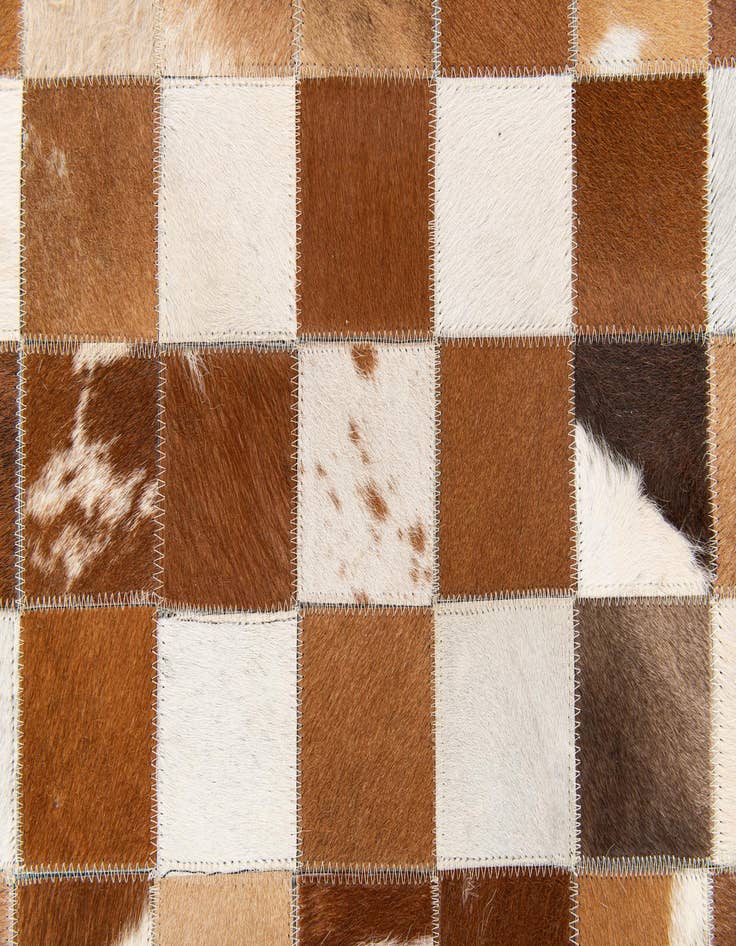 Detail image of  5' x 7' 11 Cowhide Stocks Rug