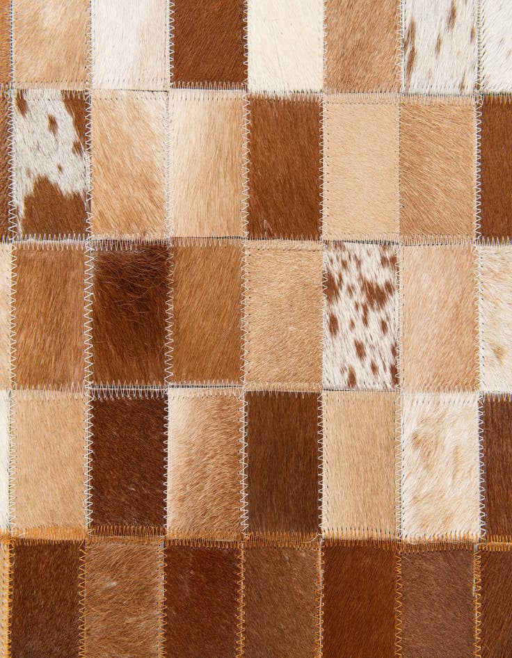 Detail image of  4' 10 x 8' Cowhide Stocks Rug