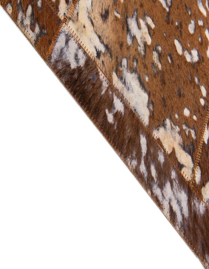 Detail image of  5' 2 x 8' Cowhide Stocks Rug