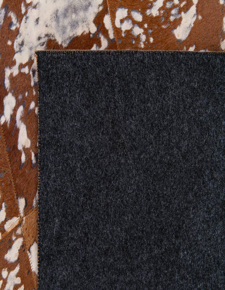 Detail image of  5' 2 x 8' Cowhide Stocks Rug