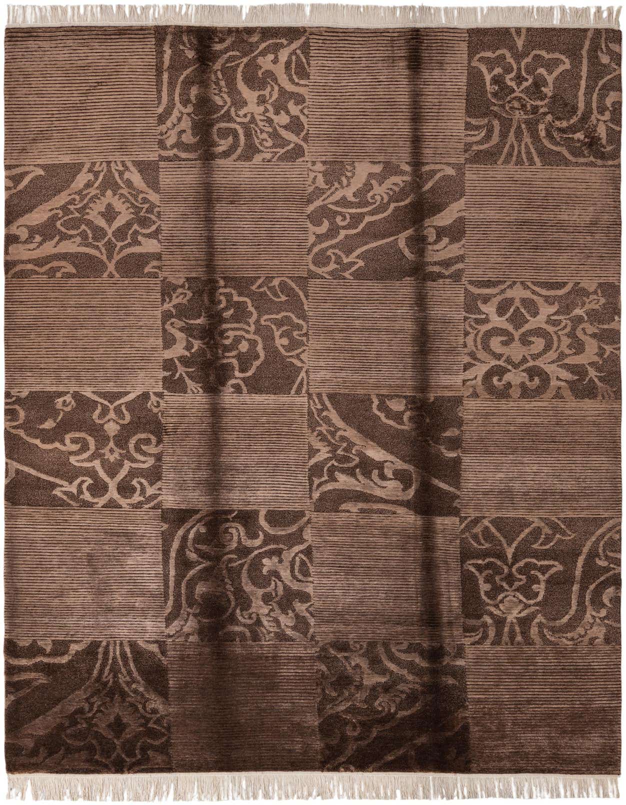 A 6x9 rectangular brown and tan wool rug featuring a modern oriental patchwork design with alternating striped and ornate floral squares.