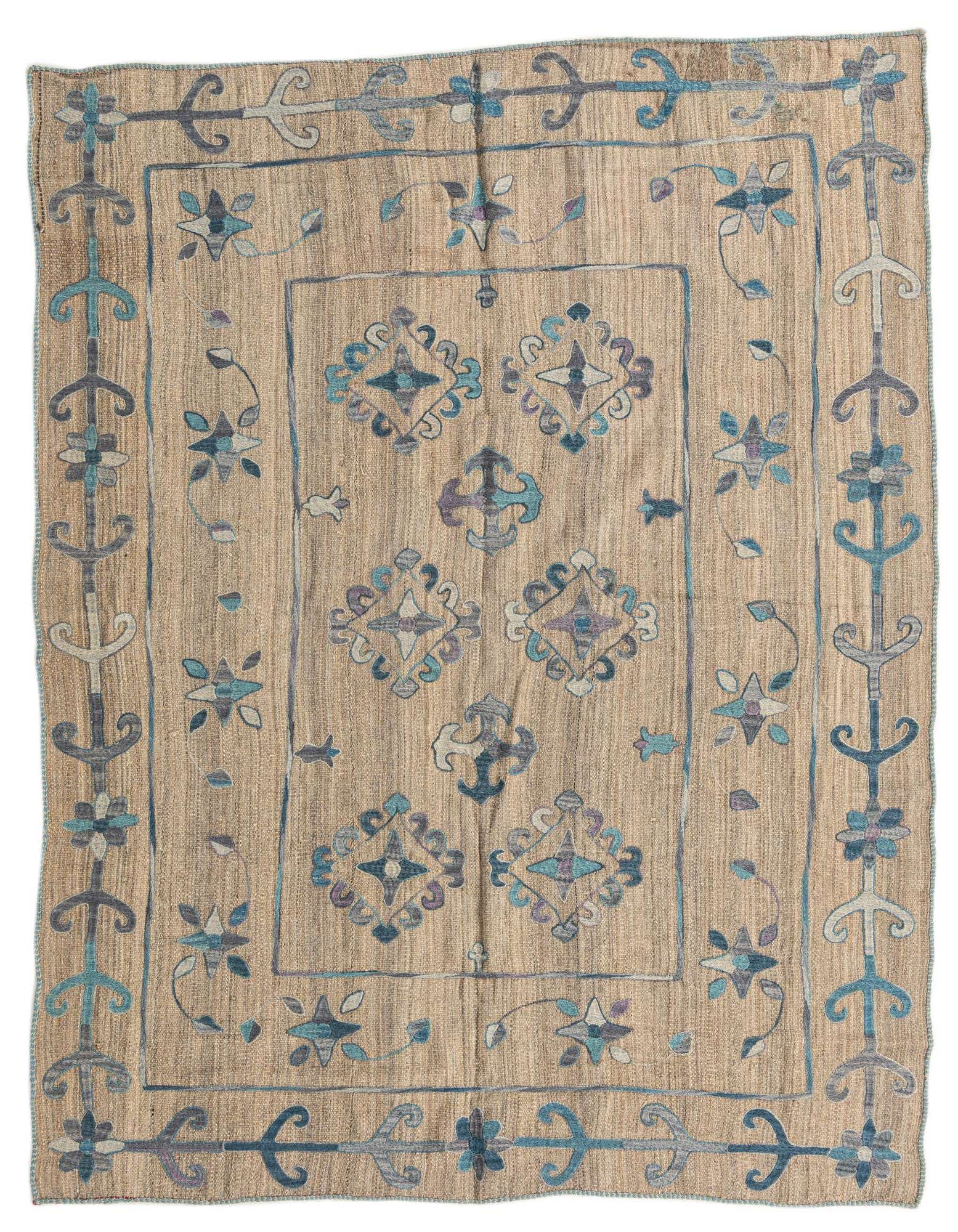 A 5x8 rectangular Kilim Modern rug with a flatweave texture. It features a tan base with a tribal pattern in shades of blue, teal, and purple.