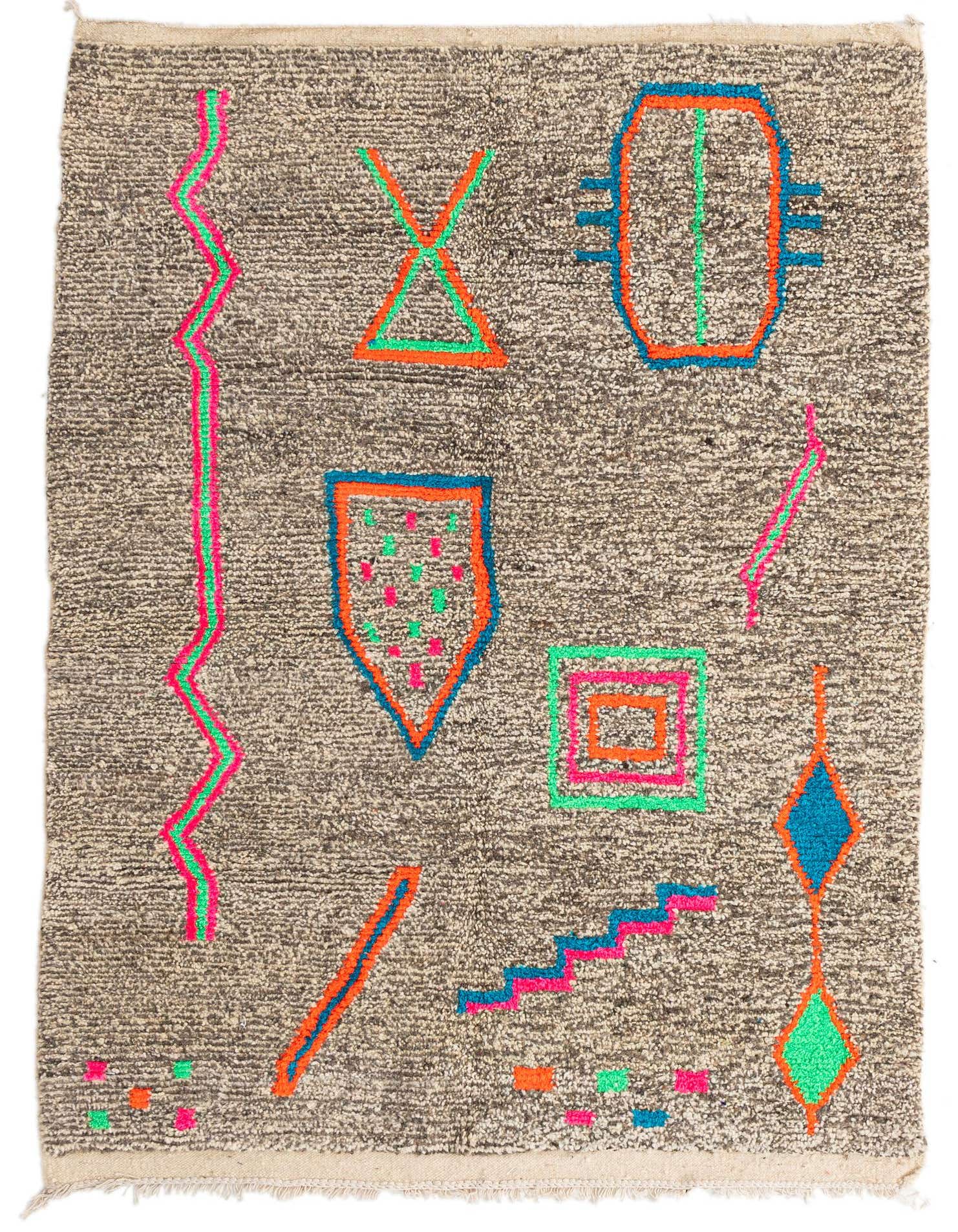 A 5x7 rectangular Moroccan shag rug with a brown and tan base, featuring colorful abstract tribal shapes in neon pink, orange, green, and blue.