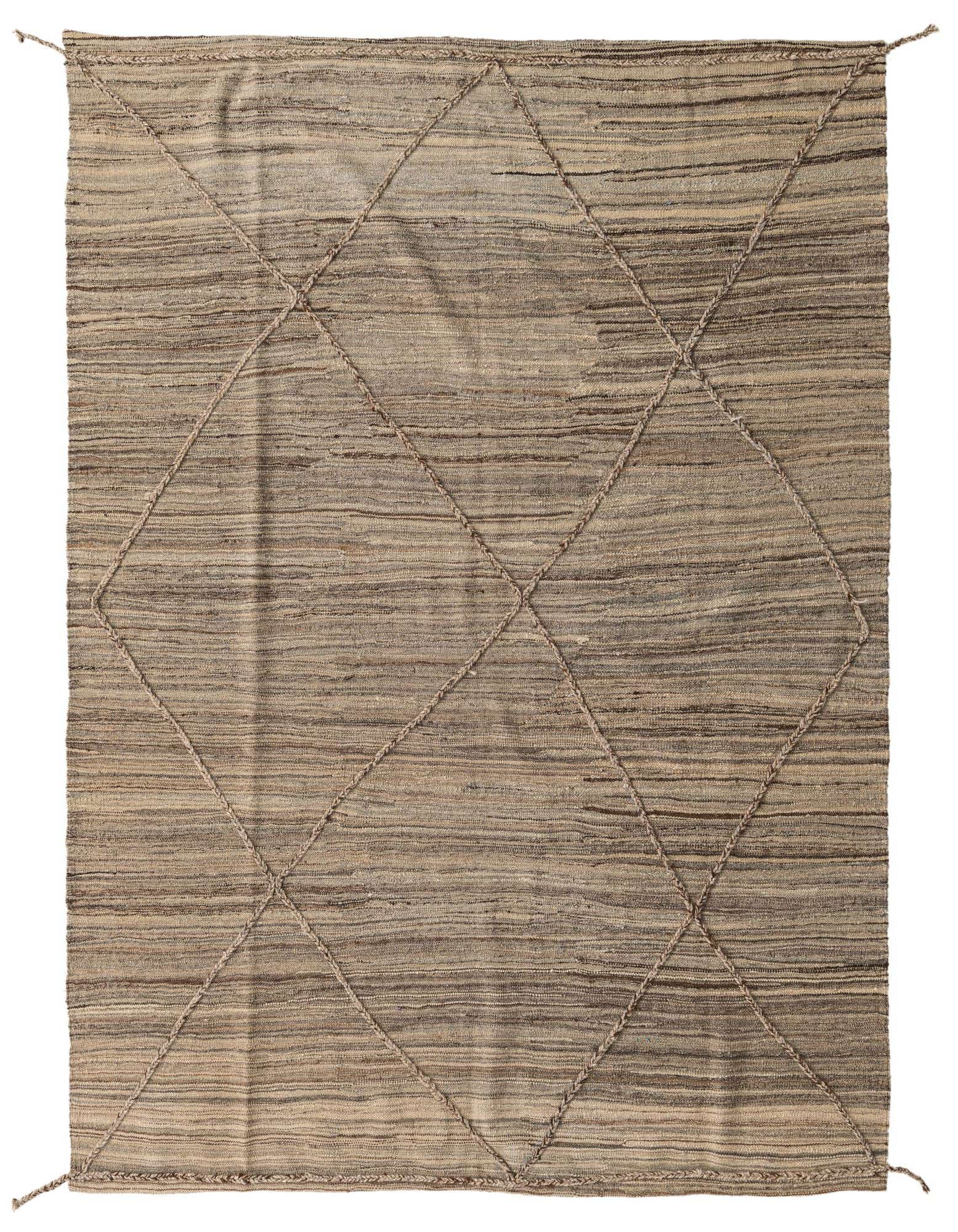 A 6x9 rectangular brown and tan wool shag rug with a tribal diamond pattern created by raised braided lines.