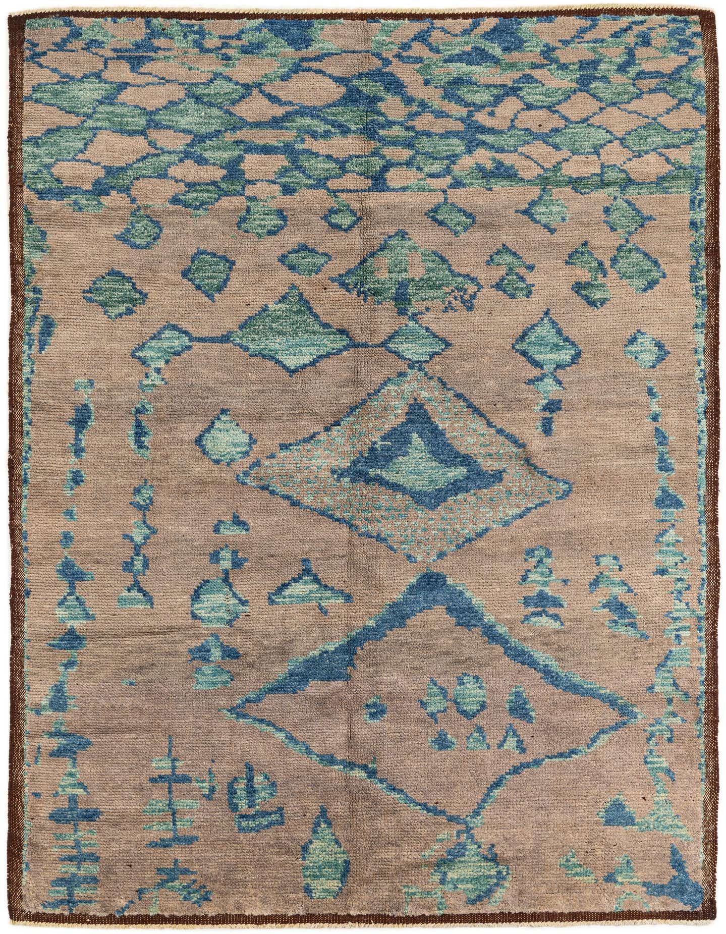 A 6x9 rectangular Moroccan shag rug with a brown background and abstract tribal patterns in shades of blue and green.