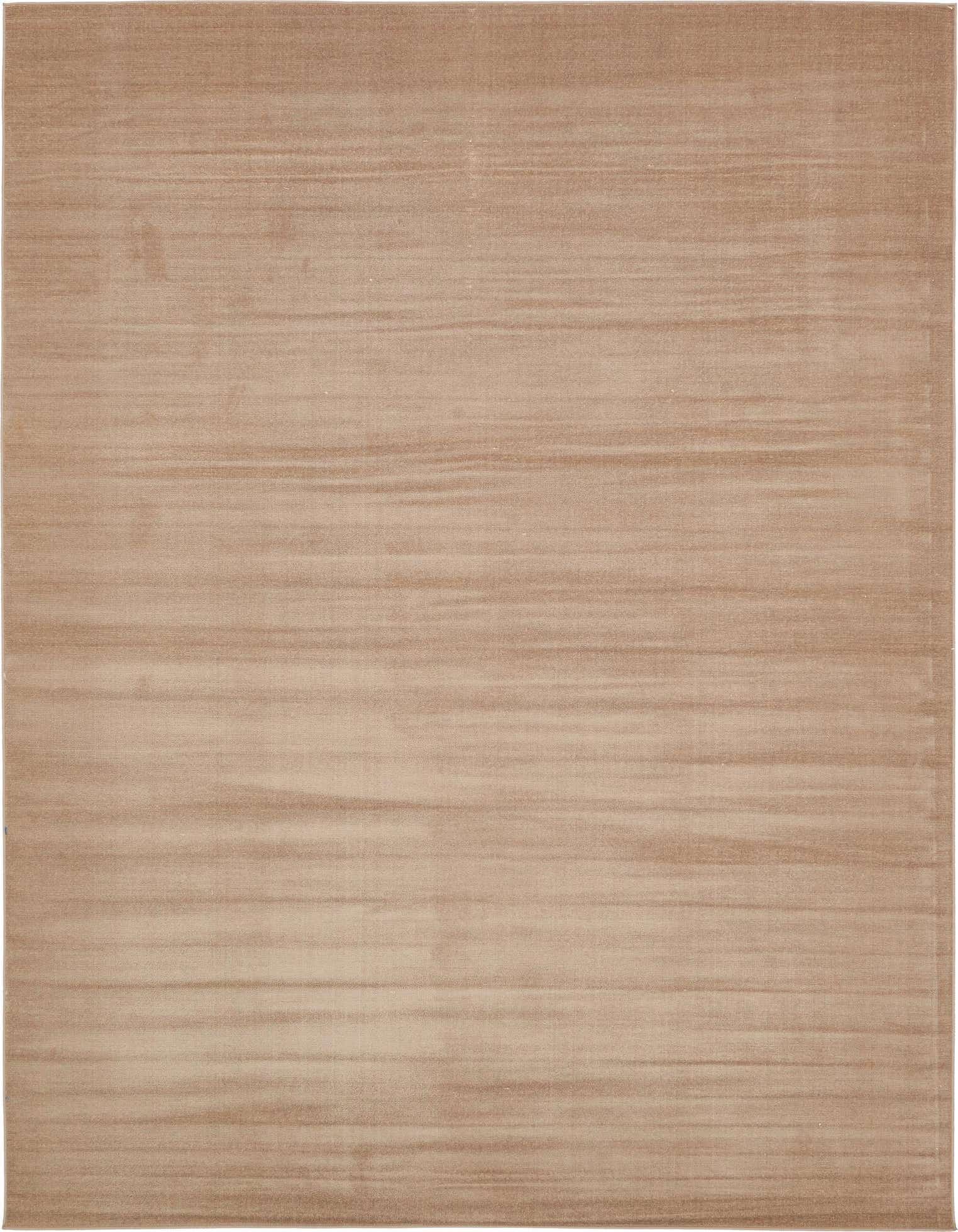 A 9x12 rectangular SoHo rug in varying shades of brown and tan, featuring a subtle urban transitional pattern.