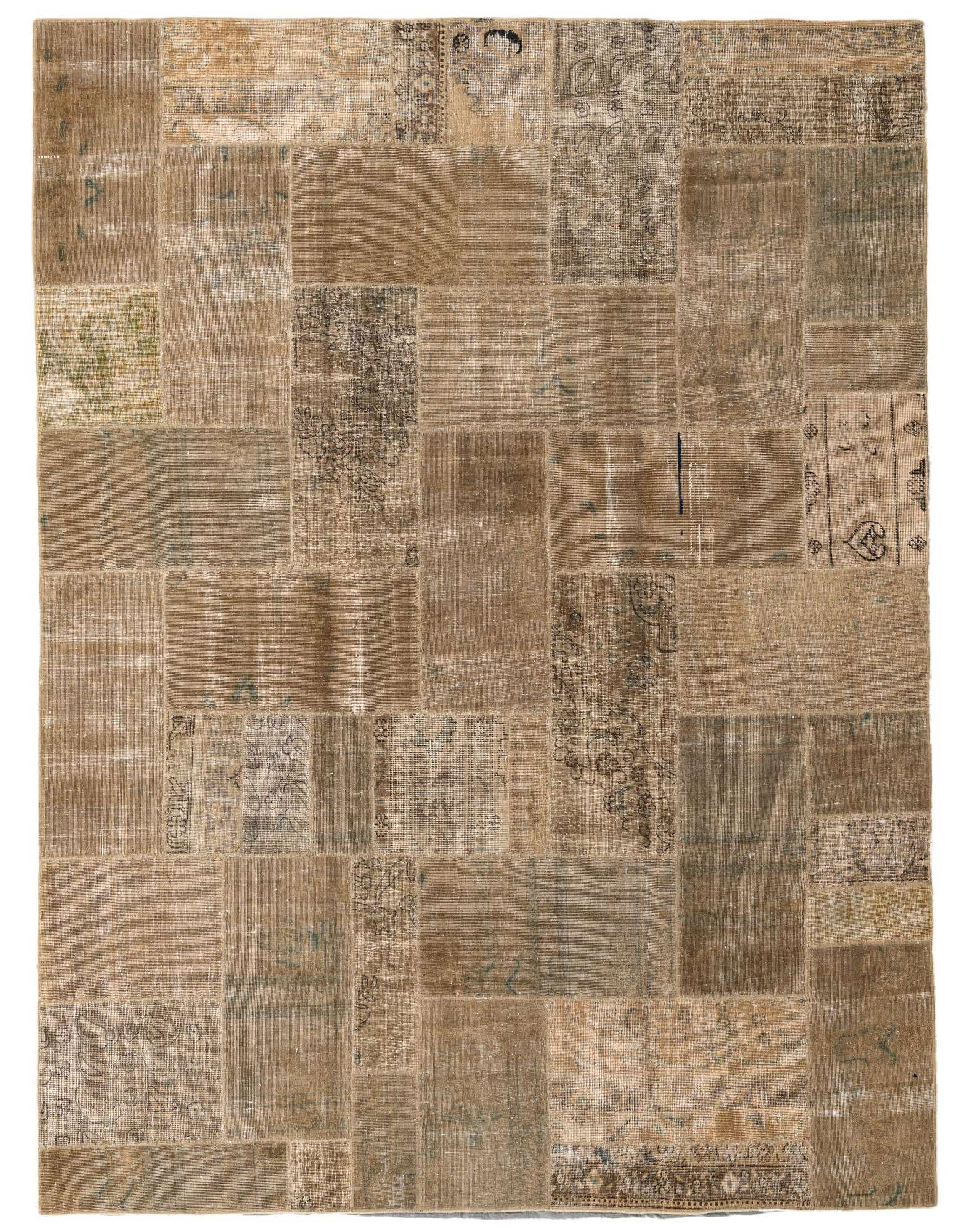 An 8x10 rectangular Rugs.com Ultra Vintage rug with a patchwork design in various shades of brown and tan.