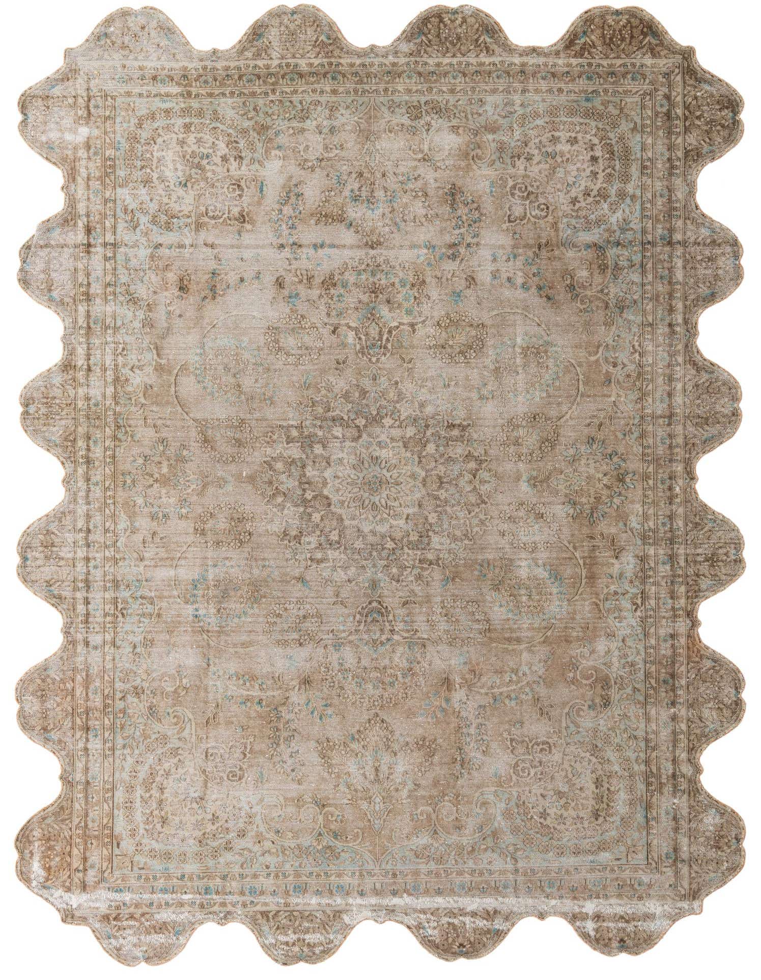 An 8x12 rectangular Ultra Vintage rug with a distressed Persian medallion pattern in browns, tans, and light blue accents, featuring a unique scalloped edge.