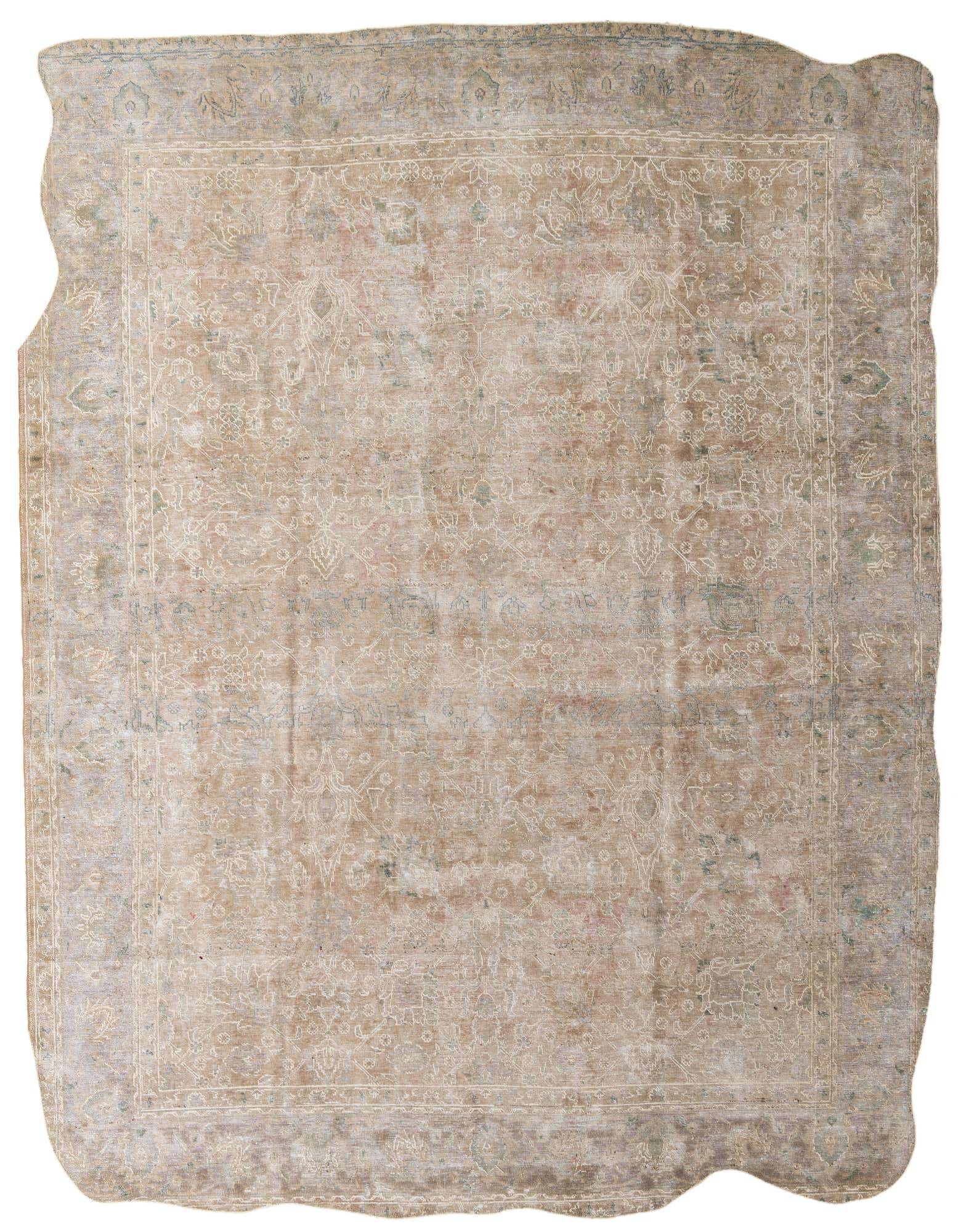 A 10x13 rectangular brown and tan Persian-style wool rug with a faded medallion pattern and subtle green and pink accents.