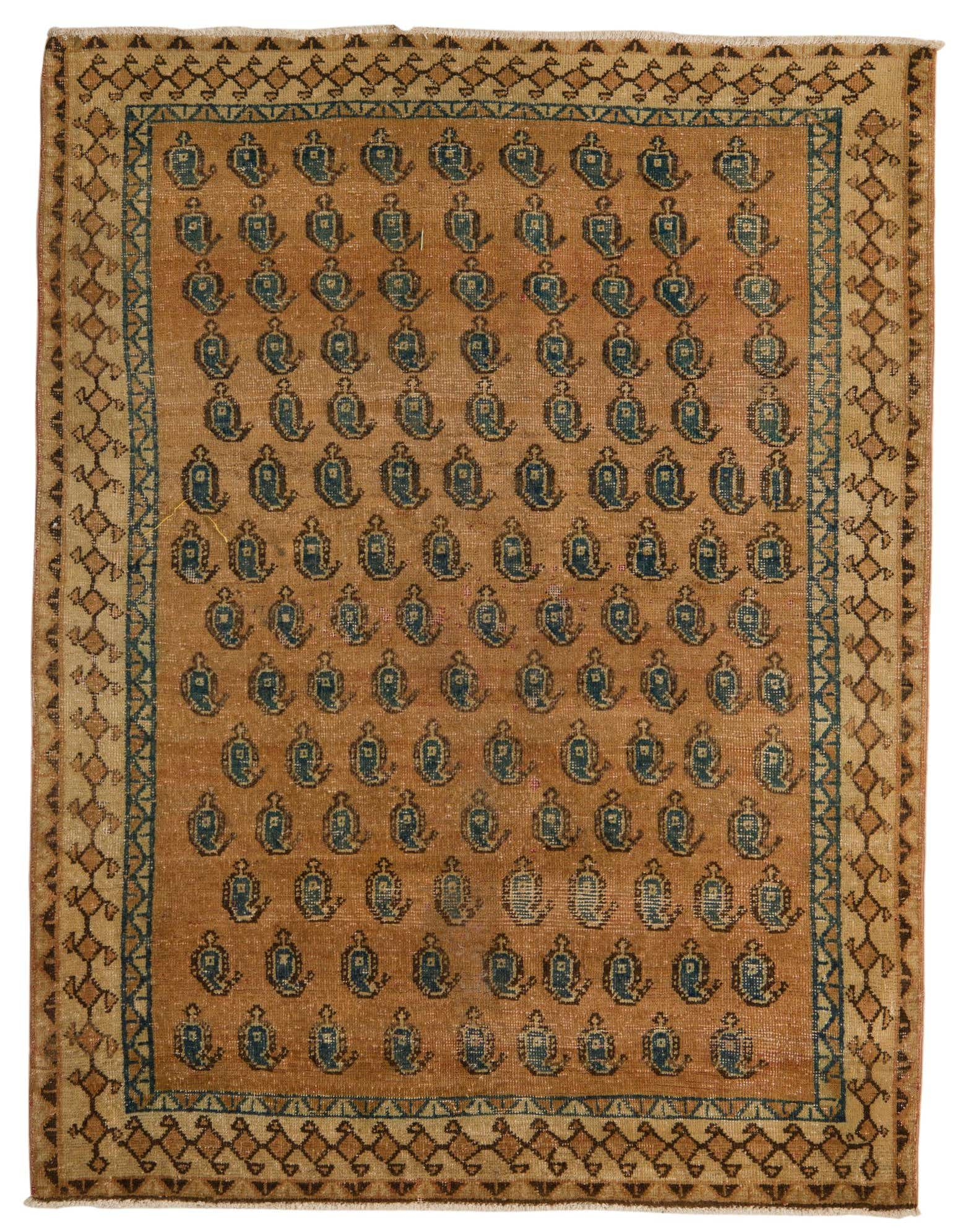 A 4x6 rectangular brown and tan Persian rug with a repeating blue paisley pattern and geometric border.