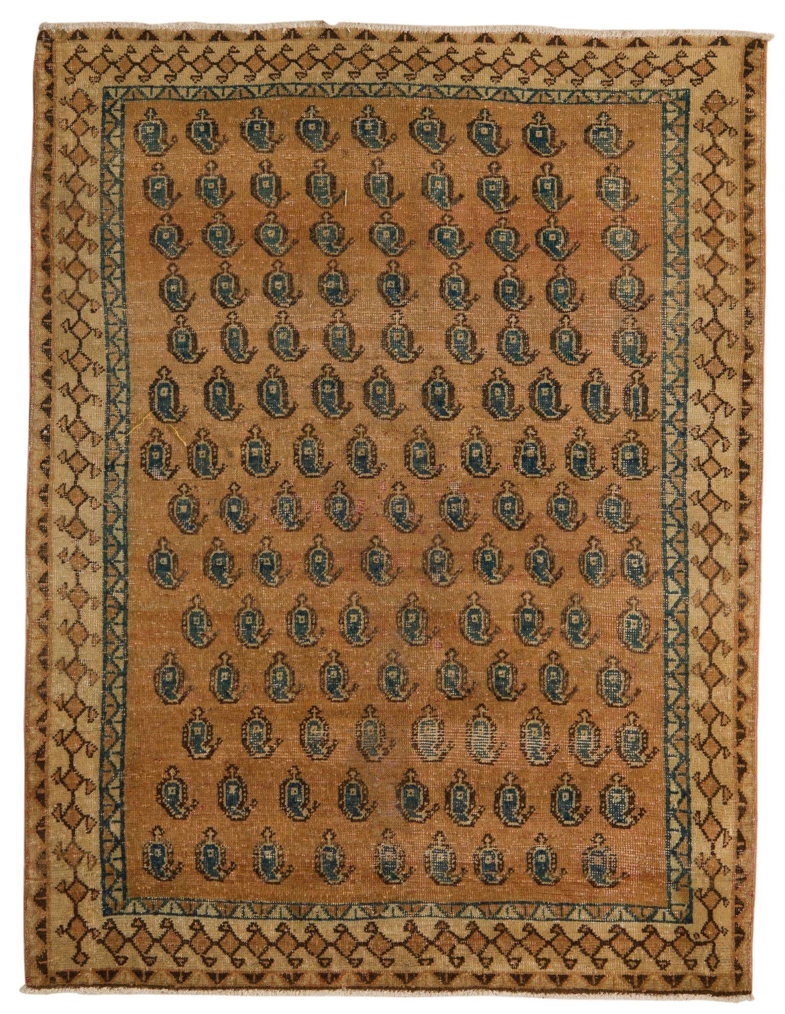 A 4x6 rectangular brown and tan Persian rug with a repeating blue paisley pattern and geometric border.