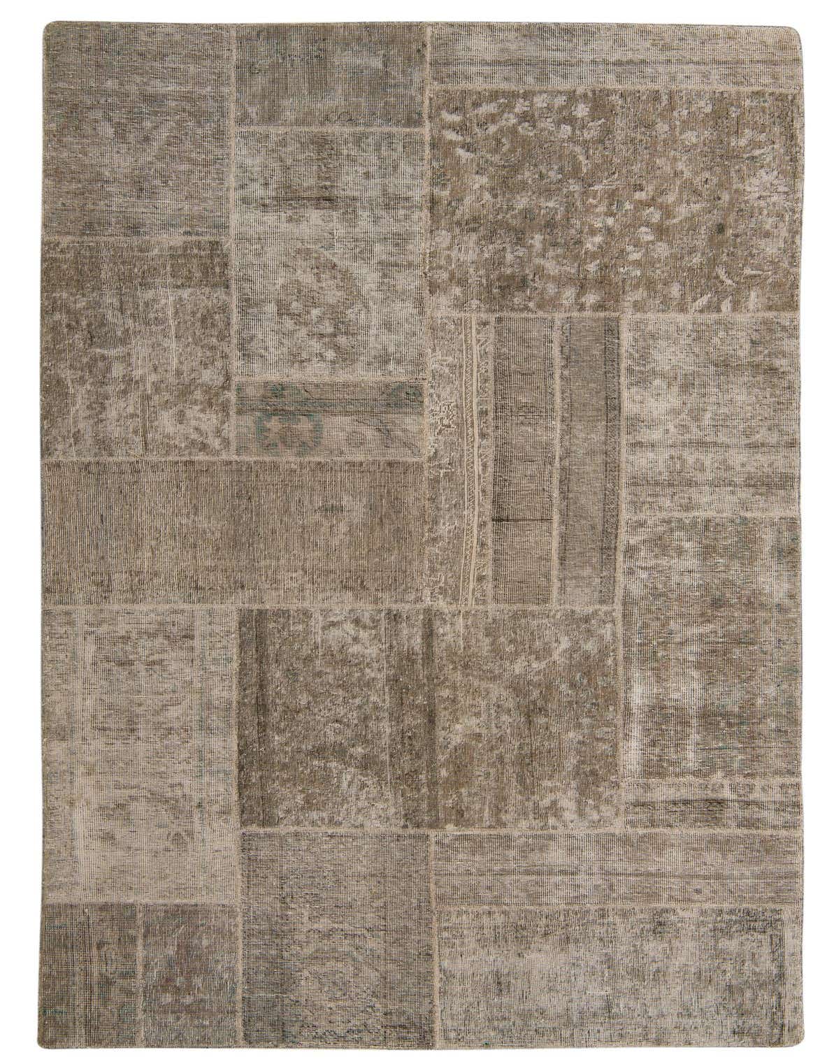 A rectangular 5x8 Ultra Vintage rug in shades of brown and tan, featuring a patchwork design with distressed Persian and abstract patterns.