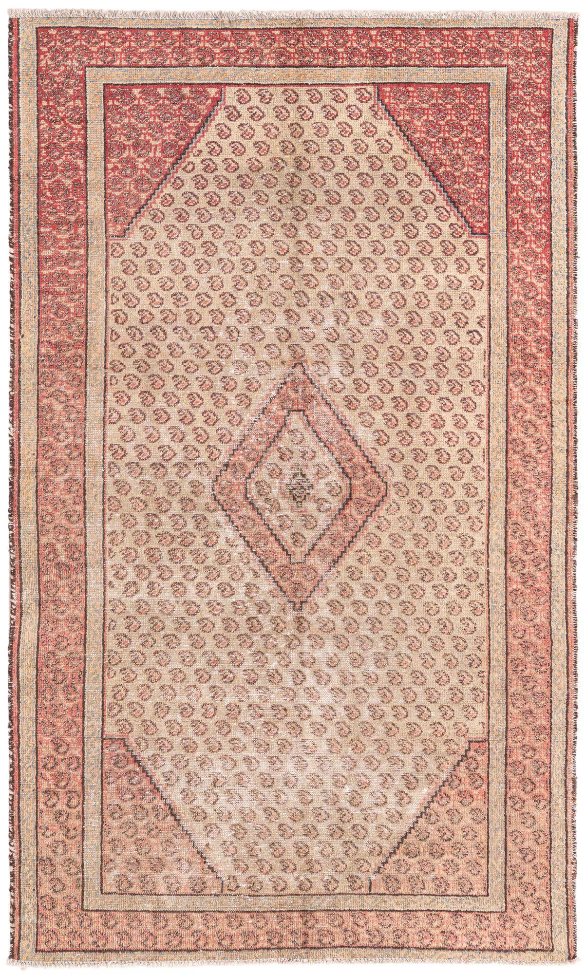 A 4x6 rectangular Rugs.com Ultra Vintage wool rug in browns and tans with a central medallion and Persian-inspired patterns.
