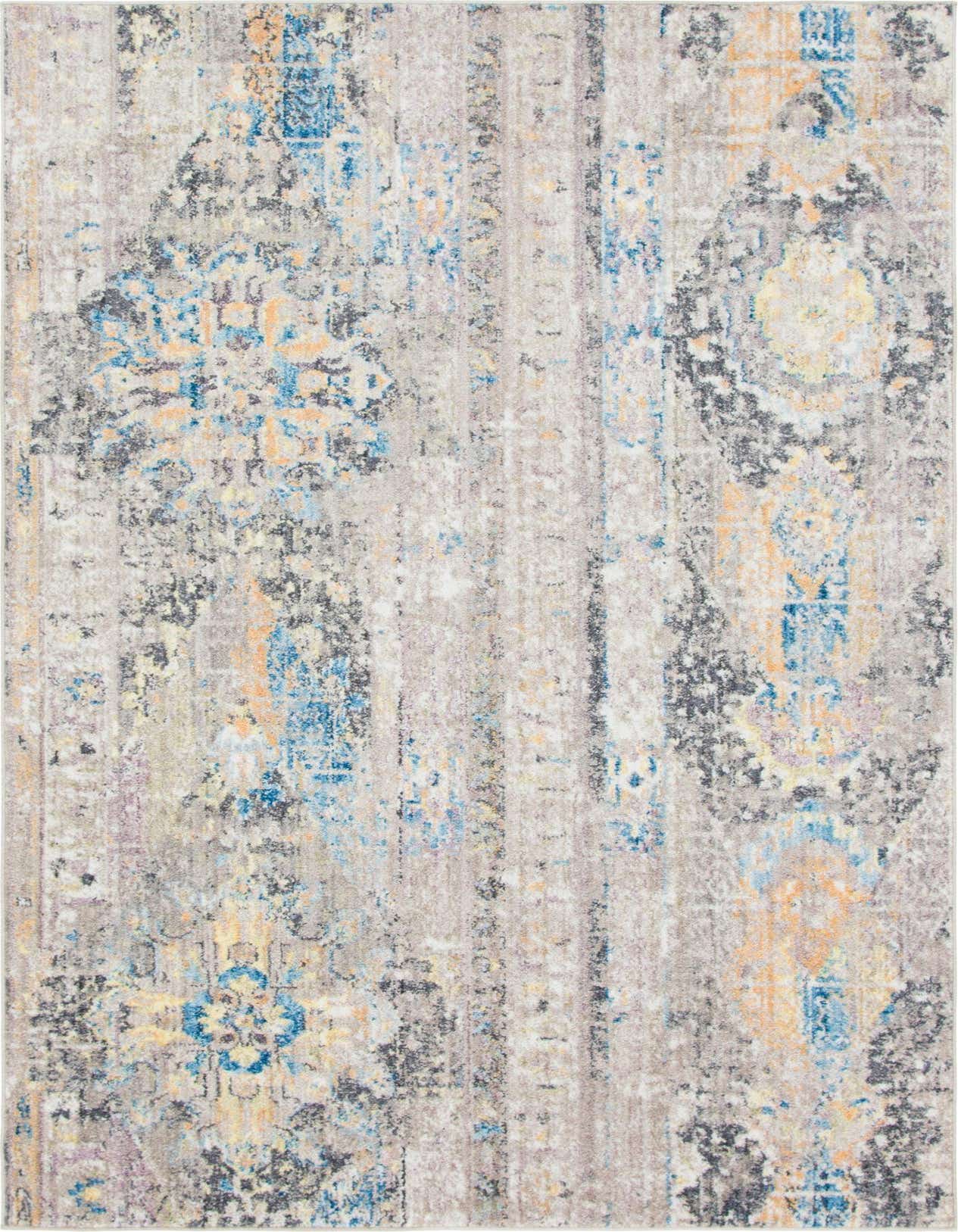 A 5x8 rectangular indoor rug with a distressed Southwestern and tribal pattern in browns, tans, blues, and oranges.