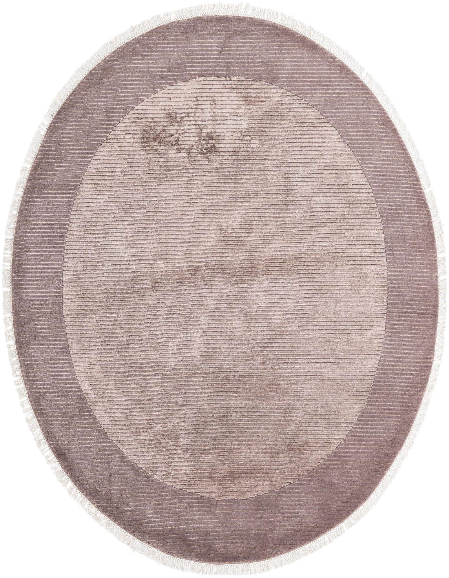 A round, high-pile Darya wool rug in shades of brown and tan, featuring a modern oriental pattern with a subtle border and fringe.