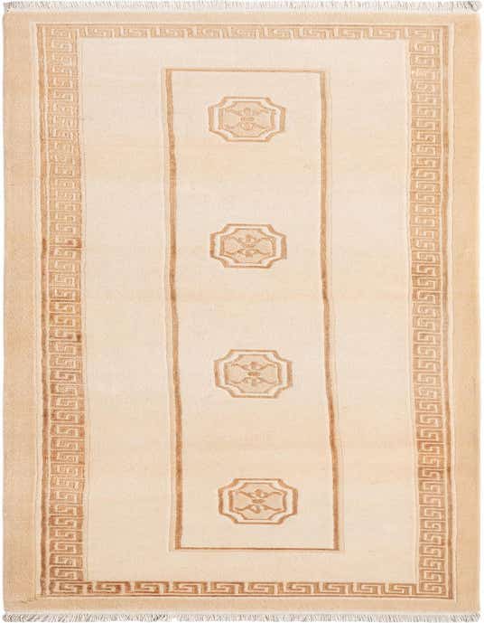 A 10 ft Darya runner rug in shades of brown and tan, featuring a modern Persian pattern with a Greek key border and central medallions, ideal for a hallway.