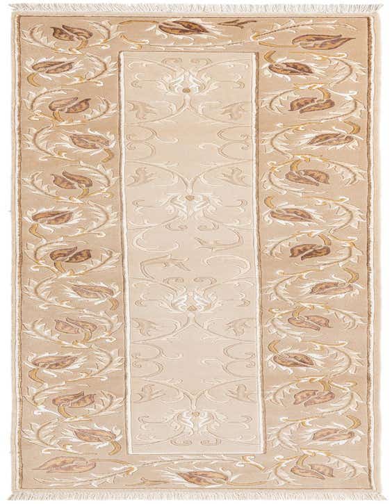 A 10 ft Darya runner rug in browns and tans with a modern Persian floral pattern, ideal for a hallway.