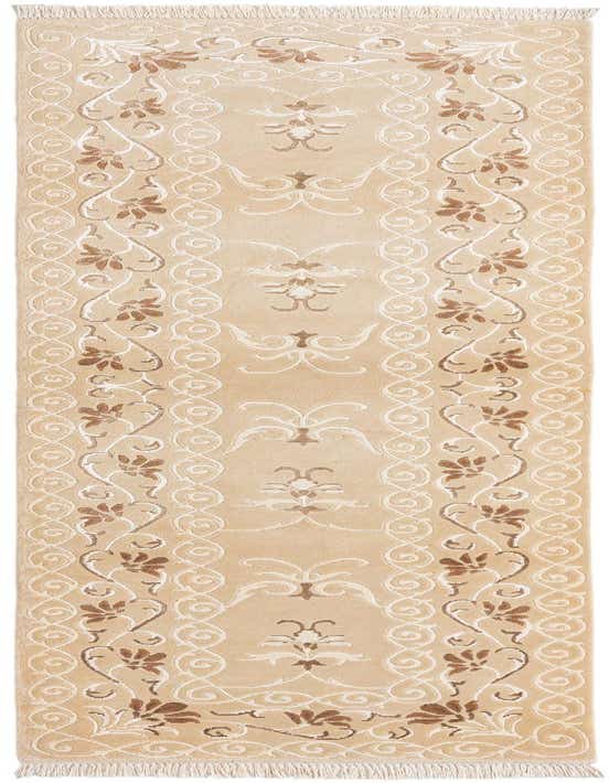 A 10 ft Darya runner rug in browns and tans, featuring a modern Persian floral and scroll pattern with fringe.