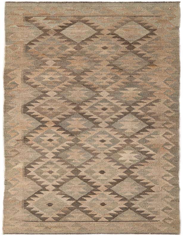 A 9 ft runner rug with a tribal geometric pattern in shades of brown and tan, perfect for a hallway.