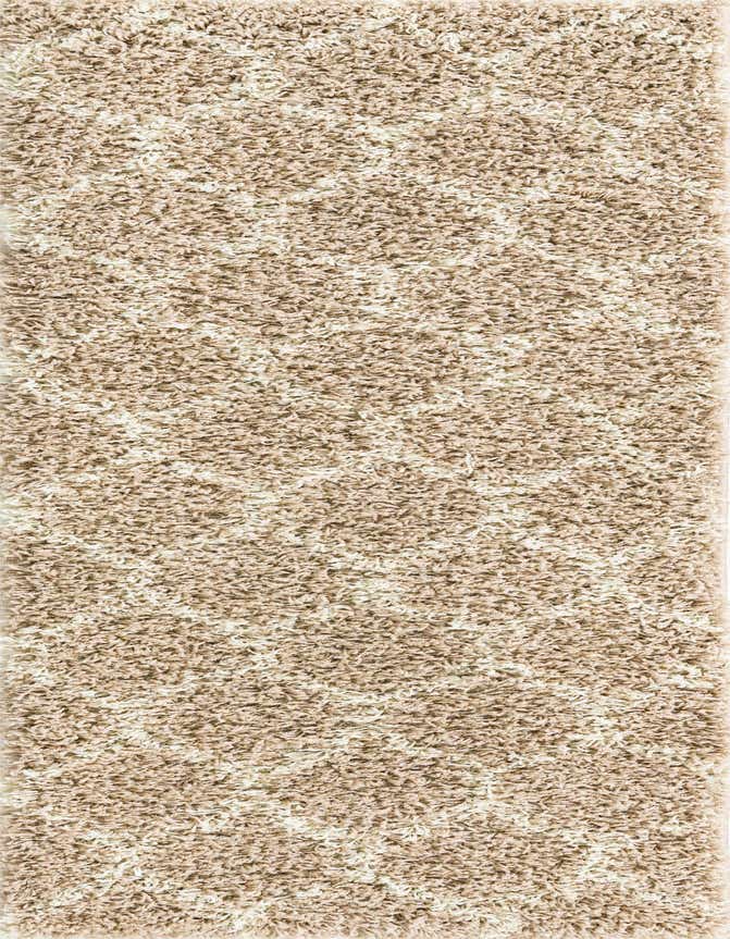 A close-up view of a 6 ft runner rug from the Rugs.com Lattice Shag collection, featuring a textured high/low pile in varying shades of brown and tan.