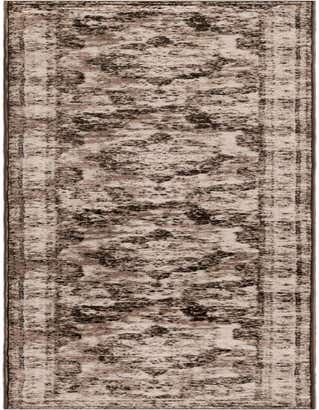 A 13 ft runner rug in shades of brown and tan, featuring a distressed medallion and border pattern, suitable for a hallway.