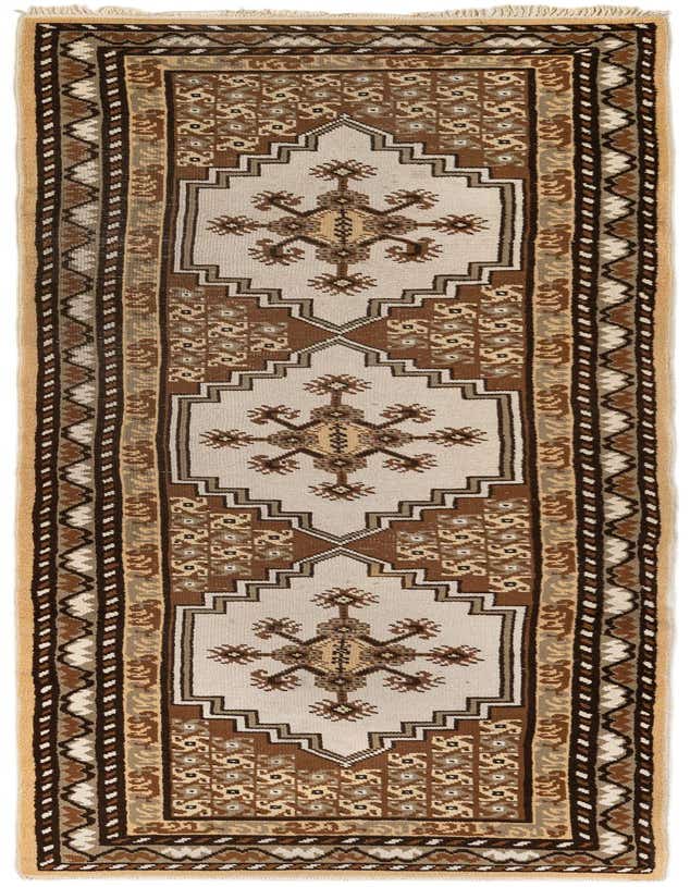 A 10 ft brown and tan Moroccan runner rug with a tribal geometric pattern, ideal for hallways.
