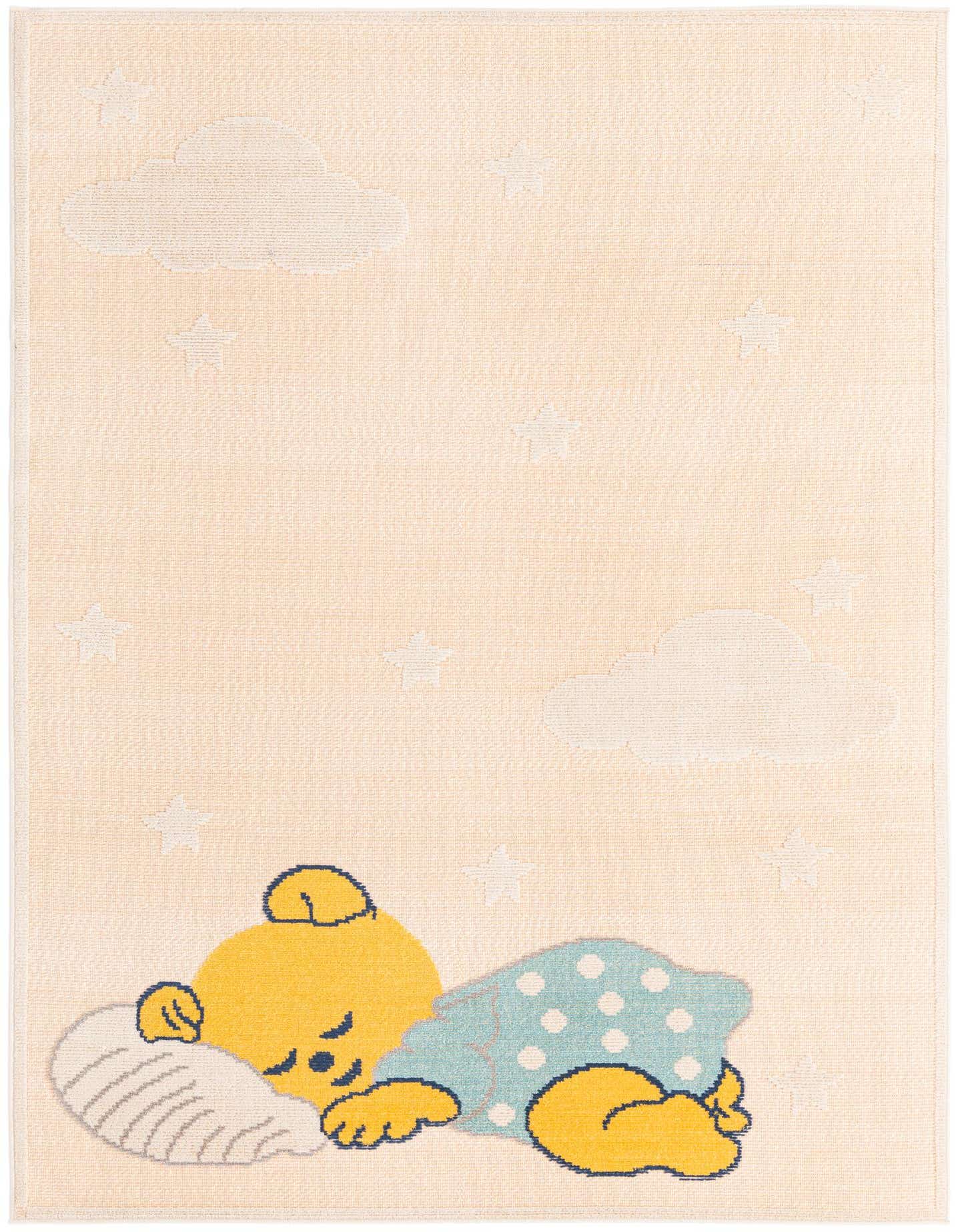 A light cream rectangular rug with a sleeping yellow bear under a blue polka-dotted blanket, surrounded by white clouds and stars.