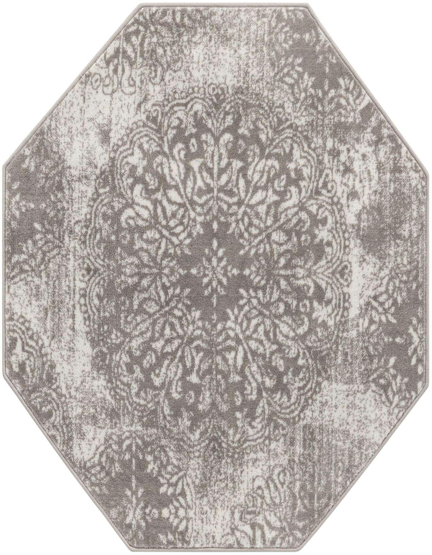 Octagon-shaped gray and silver transitional rug with a distressed floral medallion pattern, suitable for various indoor spaces.