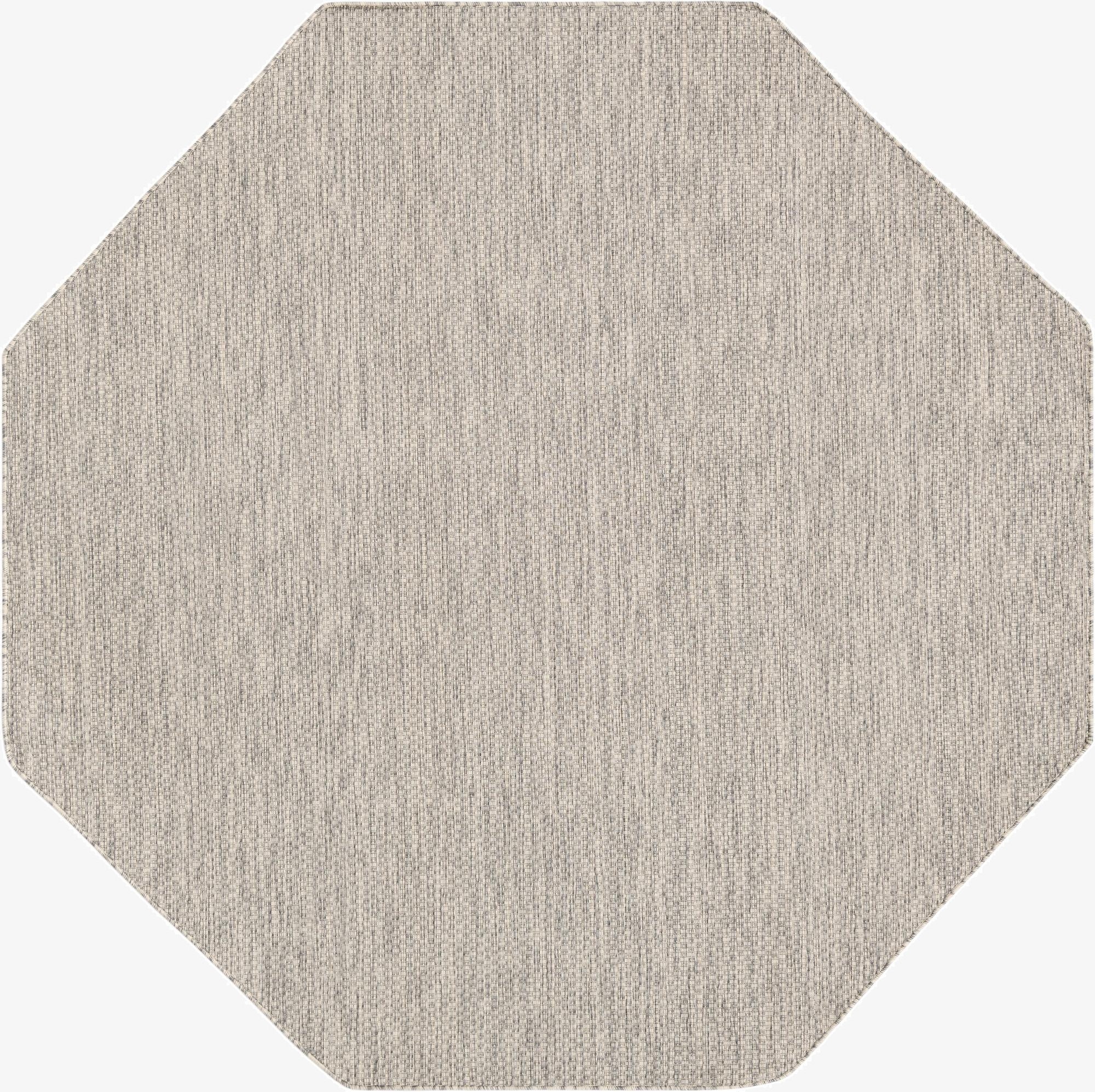 A 7' 10 x 7' 10 octagon-shaped gray flatweave rug with a subtle textured pattern, suitable for indoor or outdoor use.