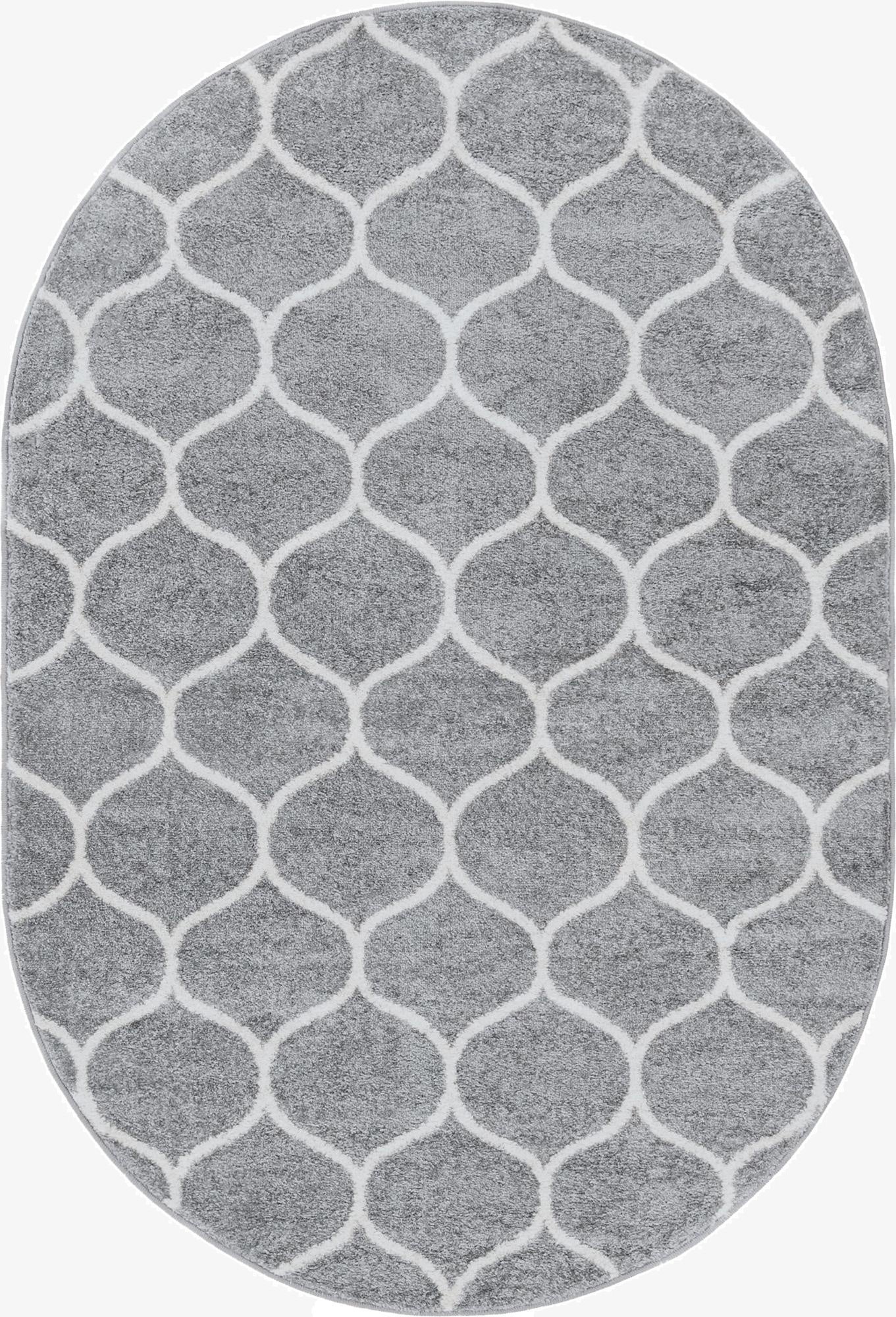 An oval 4'x6' gray modern area rug featuring a repeating white trellis pattern on a textured gray background, suitable for indoor spaces.