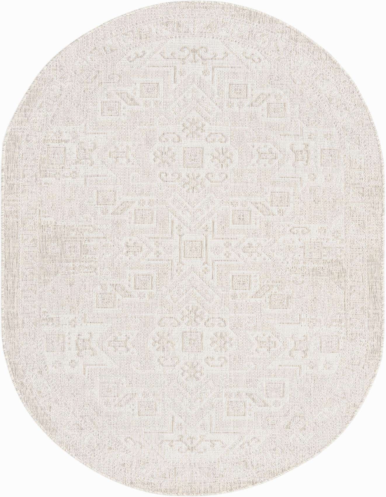 An oval 5'3" x 8'0" gray flatweave rug with a subtle Southwestern tribal pattern, suitable for indoor/outdoor use.