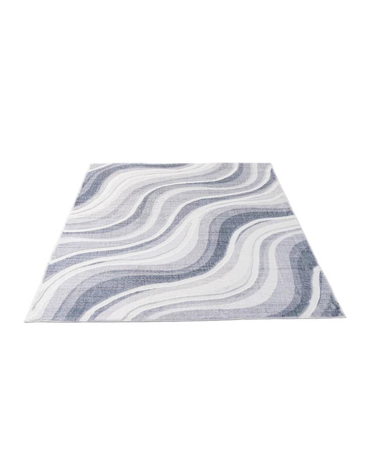 Detail image of  5' 1 x 6' 11 Carved Solid Rabbit Rug