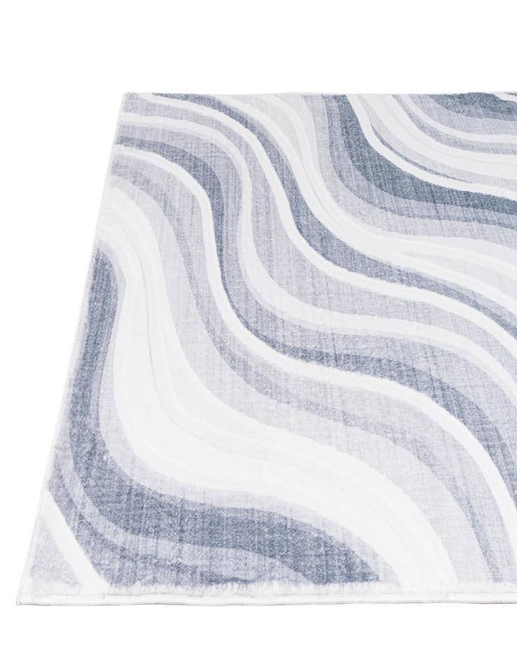 Detail image of  5' 1 x 6' 11 Carved Solid Rabbit Rug