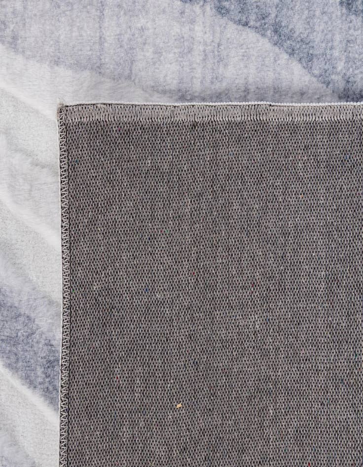 Detail image of  5' 1 x 6' 11 Carved Solid Rabbit Rug