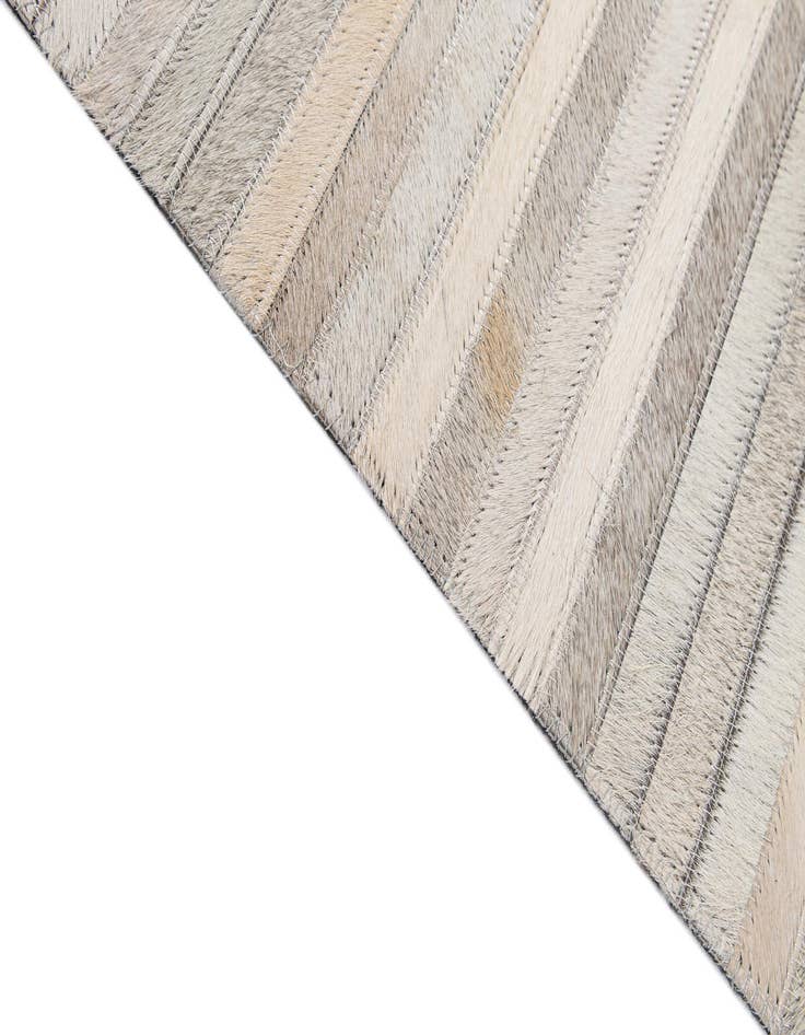 Detail image of  5' 1 x 8' 2 Cowhide - Patchwork Rug