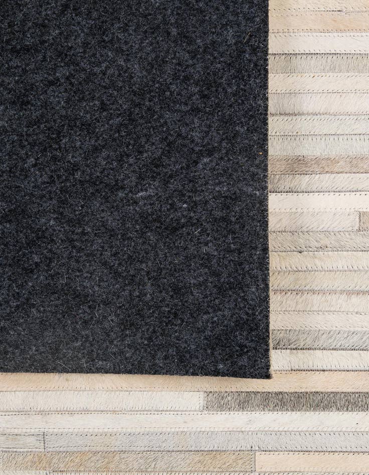 Detail image of  5' 1 x 8' 2 Cowhide - Patchwork Rug