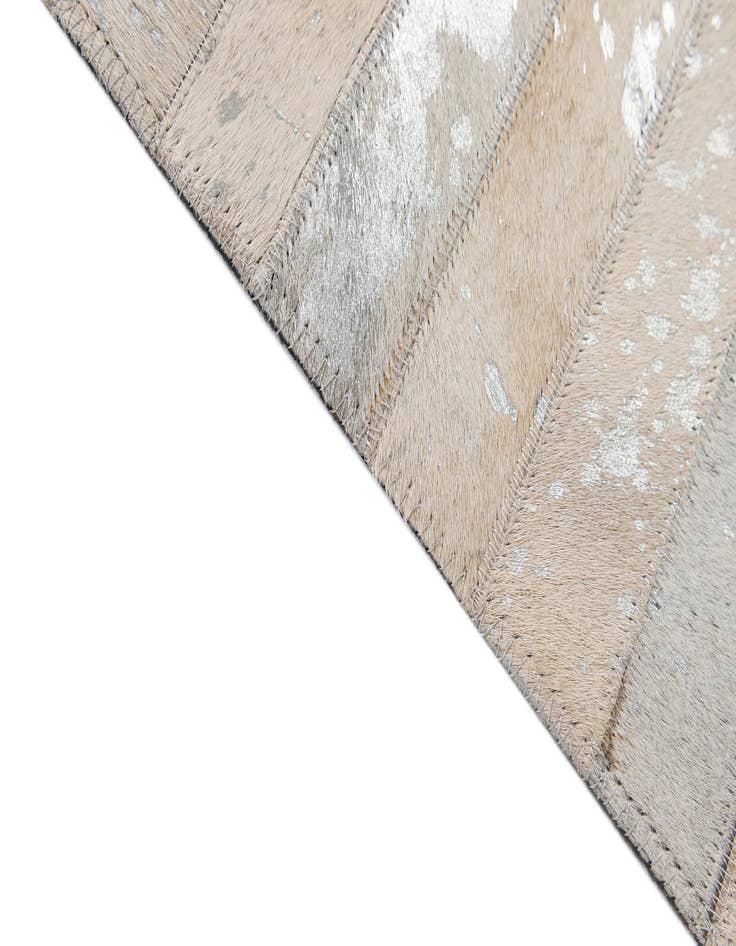 Detail image of  5' 2 x 7' 11 Cowhide - Patchwork Rug