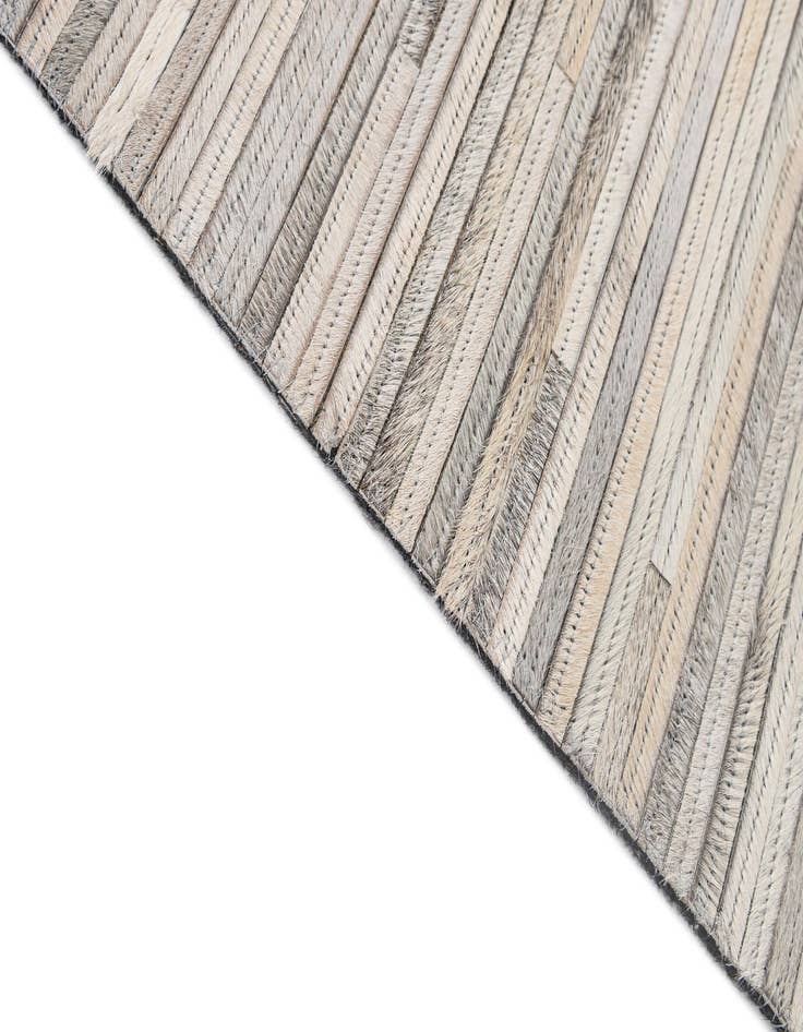 Detail image of  5' 1 x 8' 2 Cowhide - Patchwork Rug