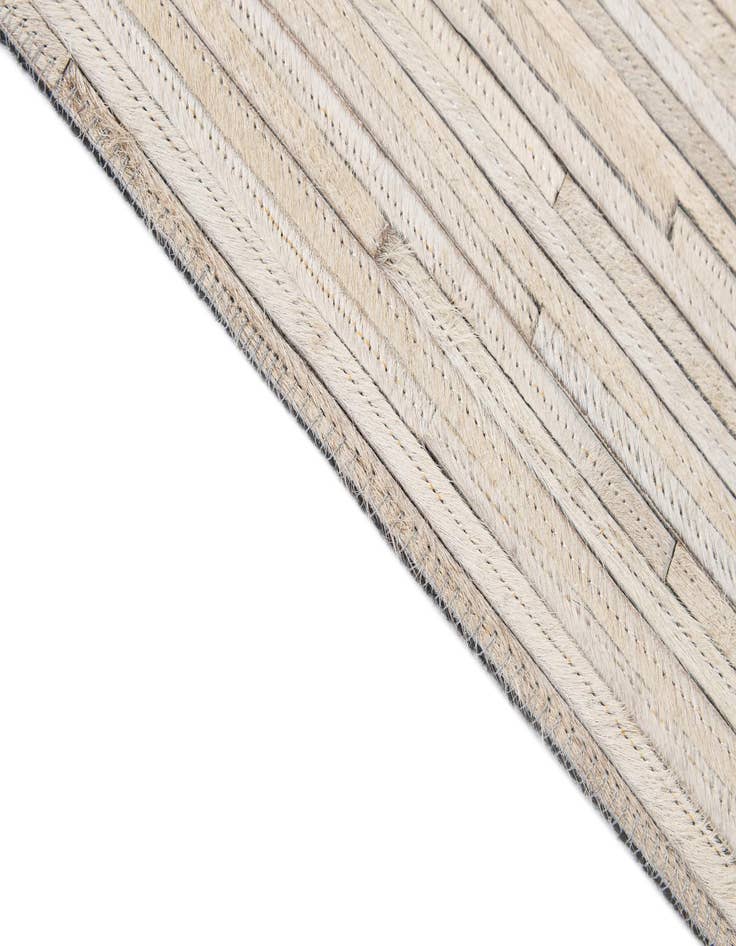 Detail image of  5' 2 x 7' 11 Cowhide - Patchwork Rug