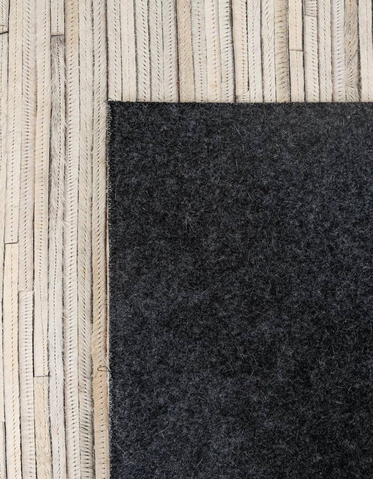 Detail image of  5' 2 x 7' 11 Cowhide - Patchwork Rug